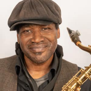 Headshot of Jerry with saxophone